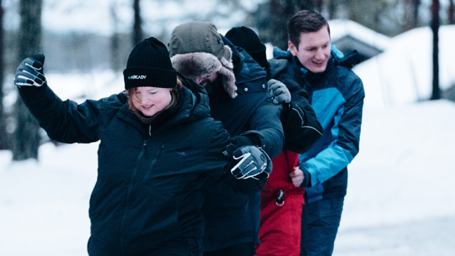 Arcady team in de sneeuw tijdens 10-jarig jubileum in Lapland